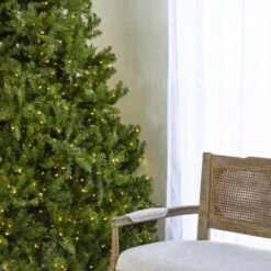 9' Indoor LED McKenzie Noble Fir Christmas Tree - Warm White 11 9' Indoor LED McKenzie Noble Fir Christmas Tree - Warm White -Twinkly Trees Shop t it 9 1212 ww 2 crop